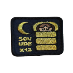 Sov ude x 12 spejdermærke